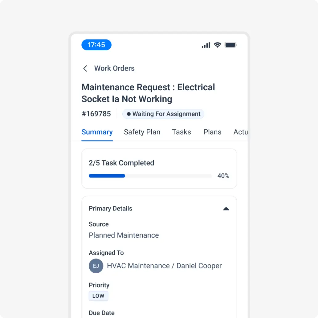 Work order scheduling software with technician assignments in calendar view.